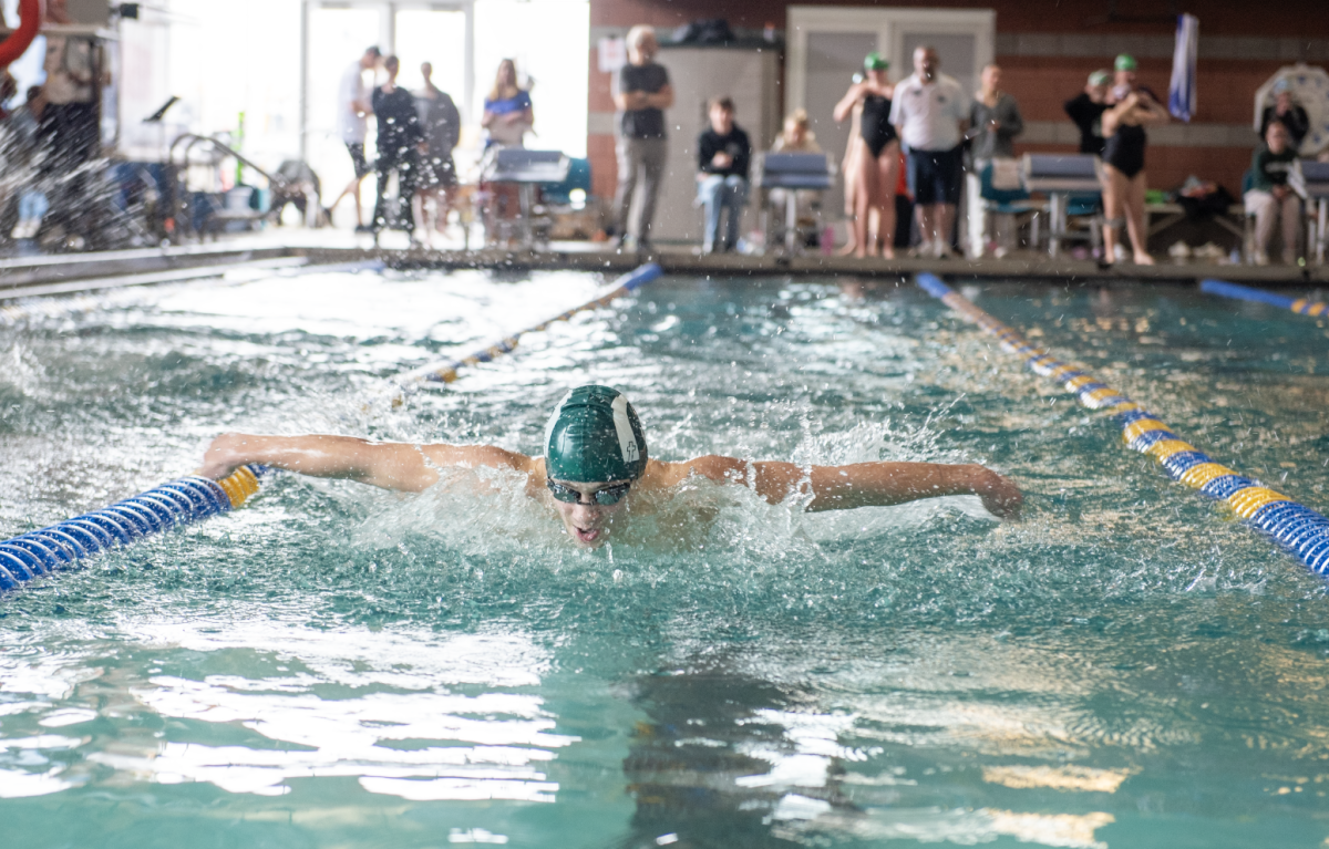 1.31.25 Sophomore Caleb Kay swims butterfly in the 200 IM. 